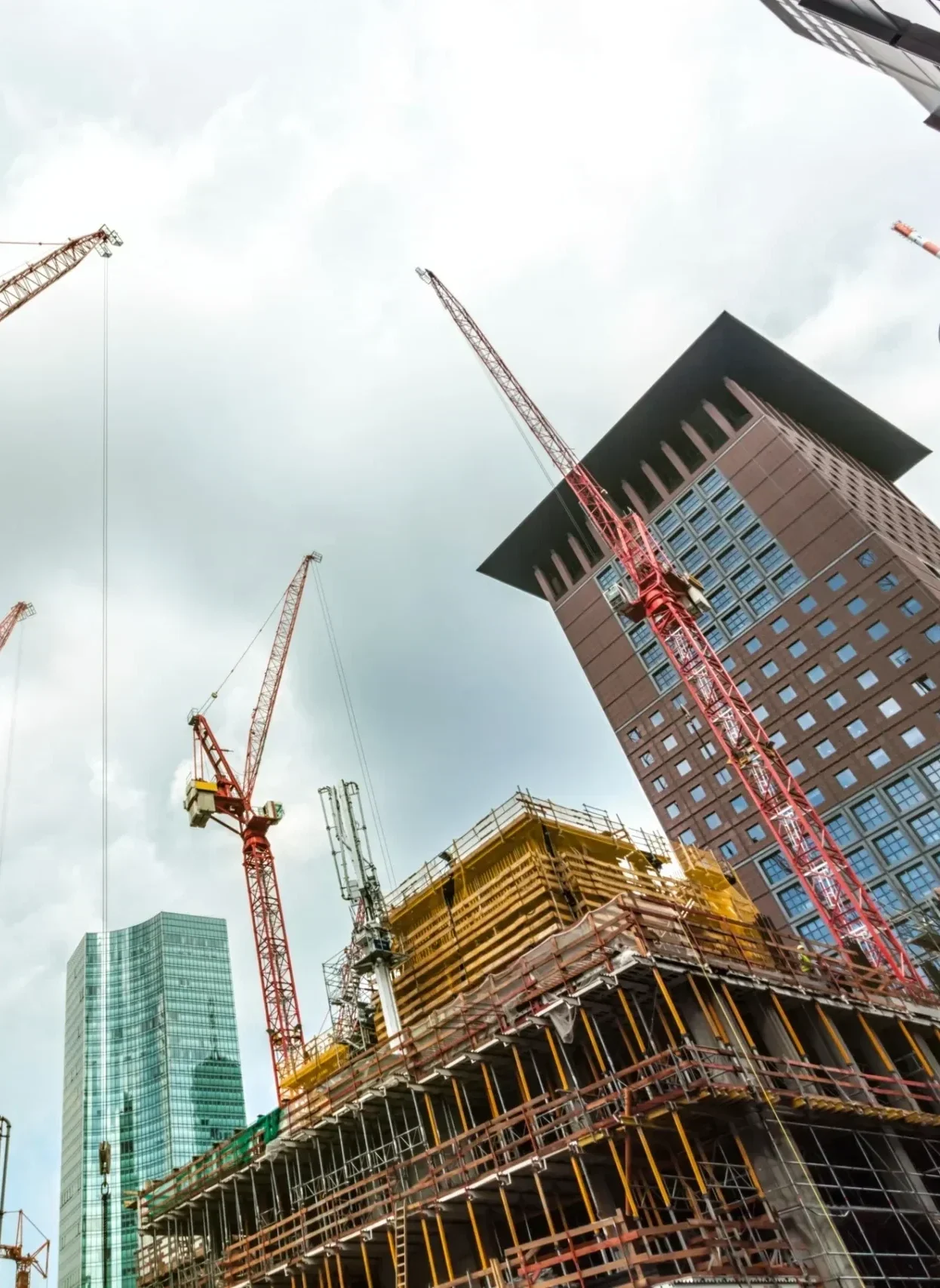 Handshake over construction plans at project closeout